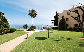 Piso Benalmádena Pueblo con vista, piscina y tranquilidad